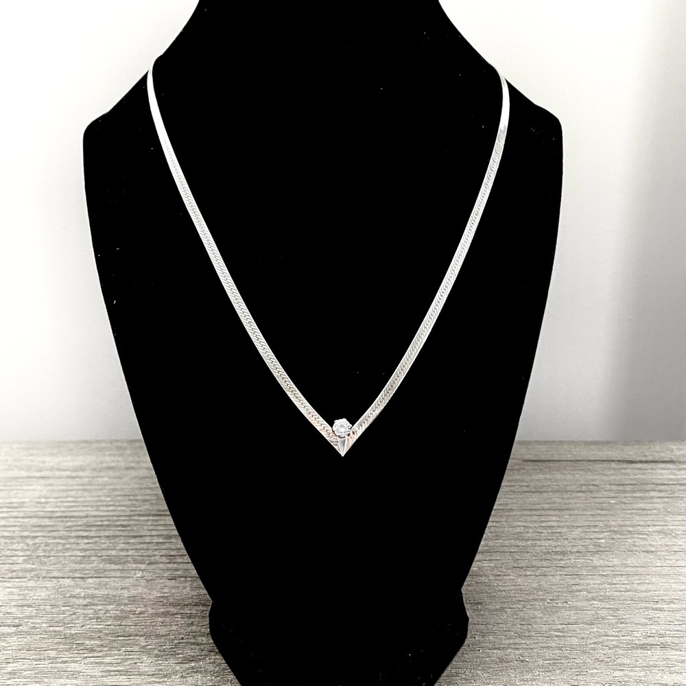 Beautiful 18” pointed .925 Sterling herringbone chain w/faceted brilliant CZ